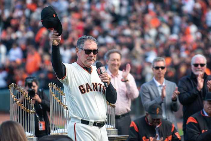 SF Giants manager Bruce Bochy (15) speaks to fans during a tribute. (2019)